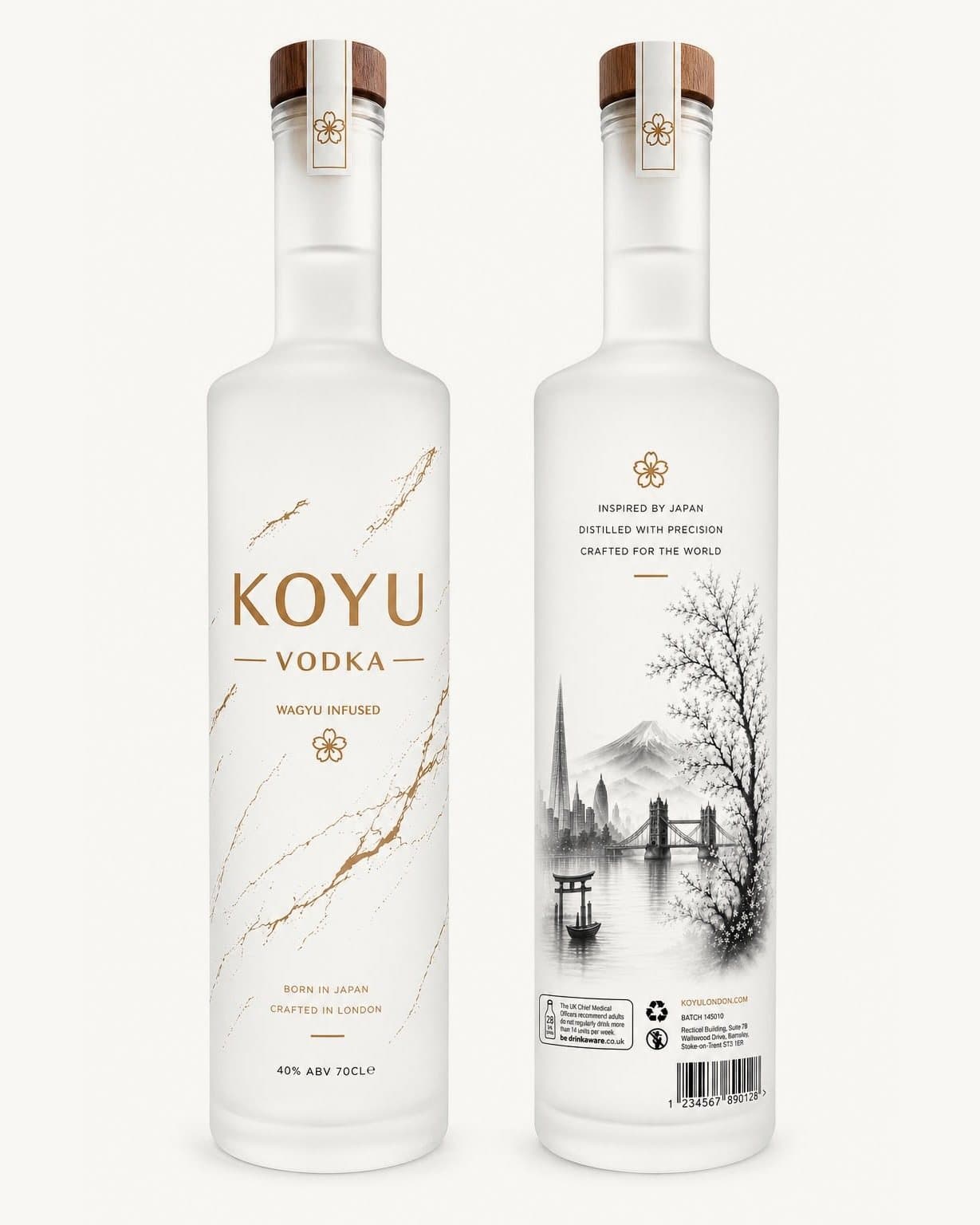 Two bottles of KOYU Vodka, one showing the gold face and one the ink-wash reverse